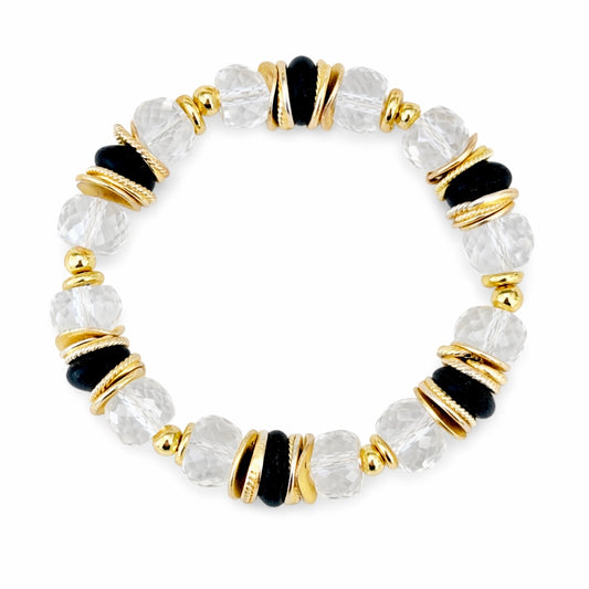 FACETED LUCITE BANGLE WITH GOLD, WAVY DISC AND BLACK ACCENTS