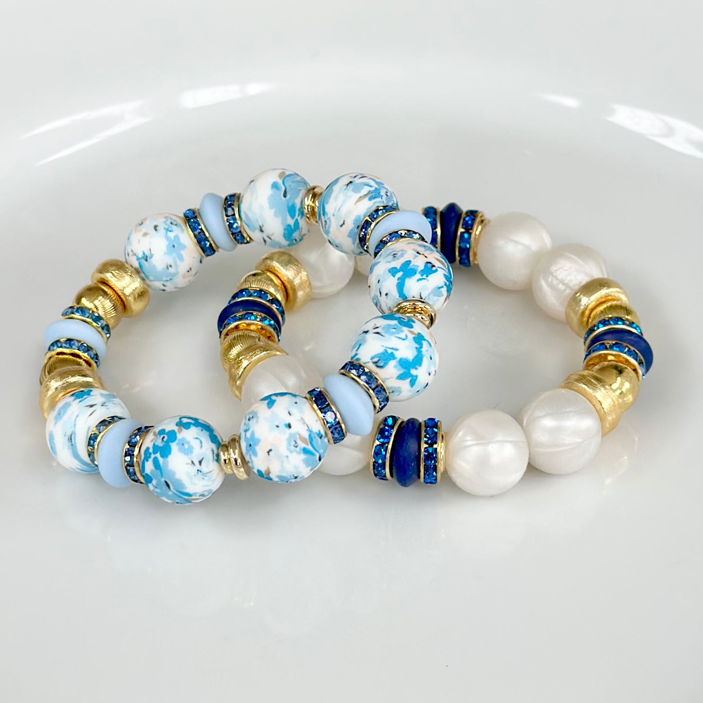 PEARLIZED IVORY BANGLE WITH DARK BLUE AND CZ ACCENTS