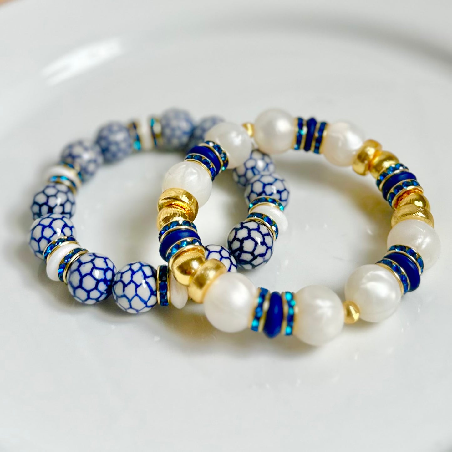 PORCELAIN BANGLE WITH WHITE AND BLUE CZ ACCENTS