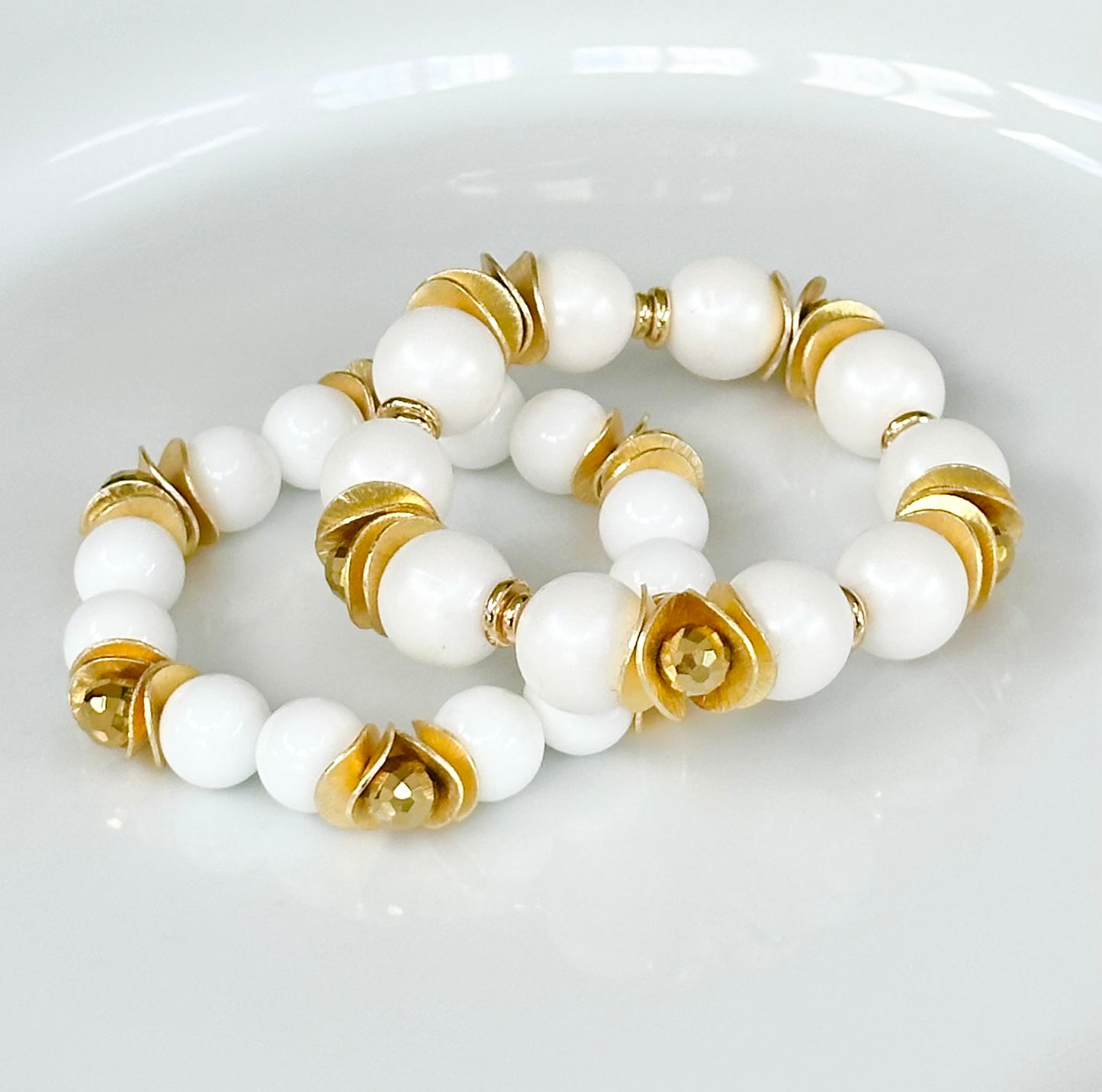 OPALIZED WHITE BANGLE WITH GOLD WAVY DISC AND CRYSTAL ACCENTS