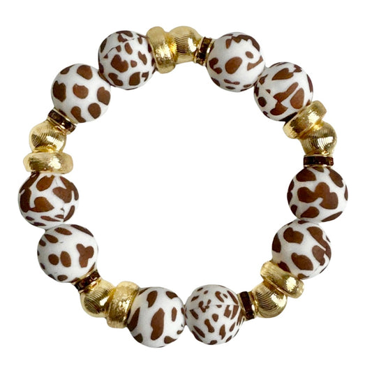 BROWN COW AND GOLD BANGLE