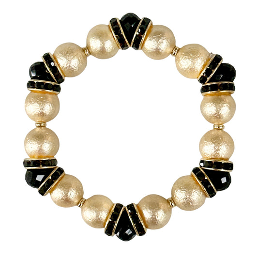 GOLD SHELL PEARL BANGLE WITH BLACK CRYSTAL ACCENTS
