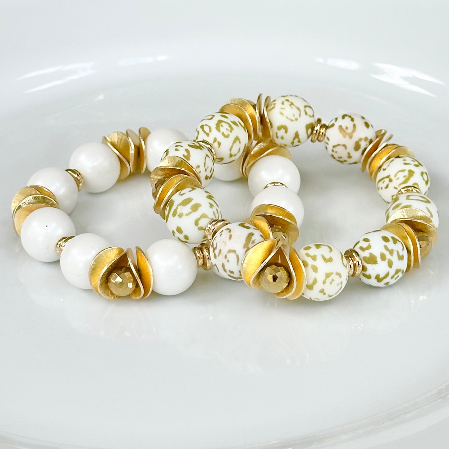 GOLD AND WHITE CHEETAH BANGLE WITH GOLD WAVY DISC AND CRYSTAL ACCENTS