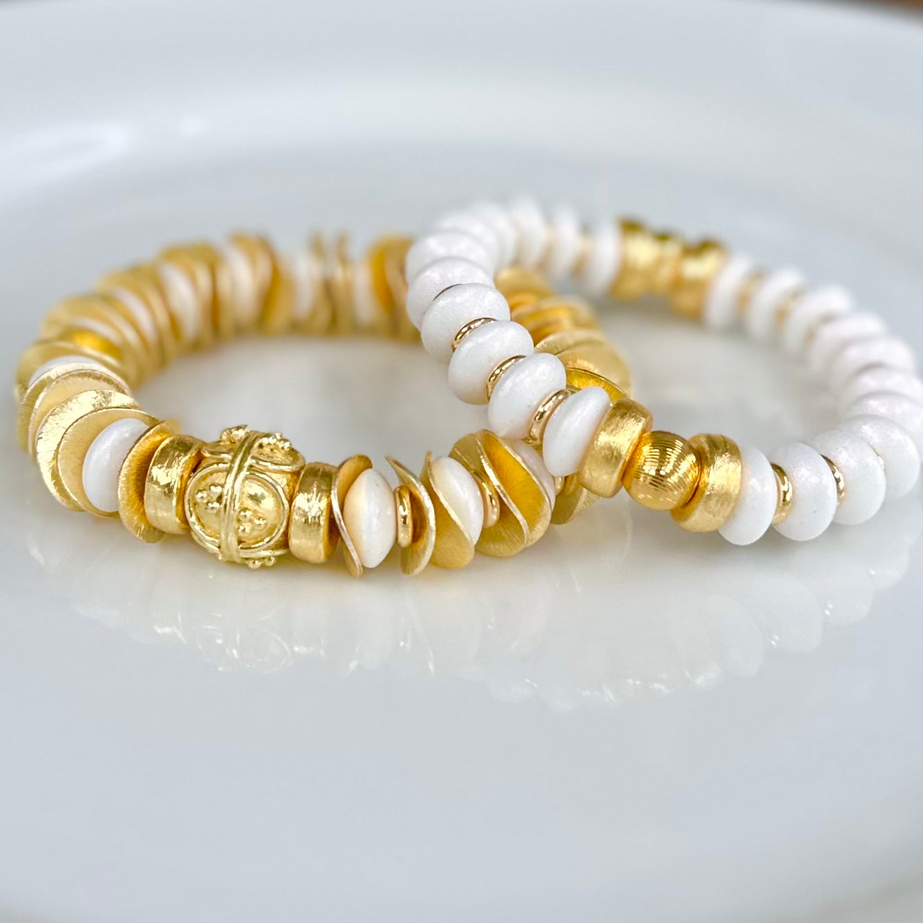 GOLD WAVY DISC AND WHITE STATEMENT BRACELET