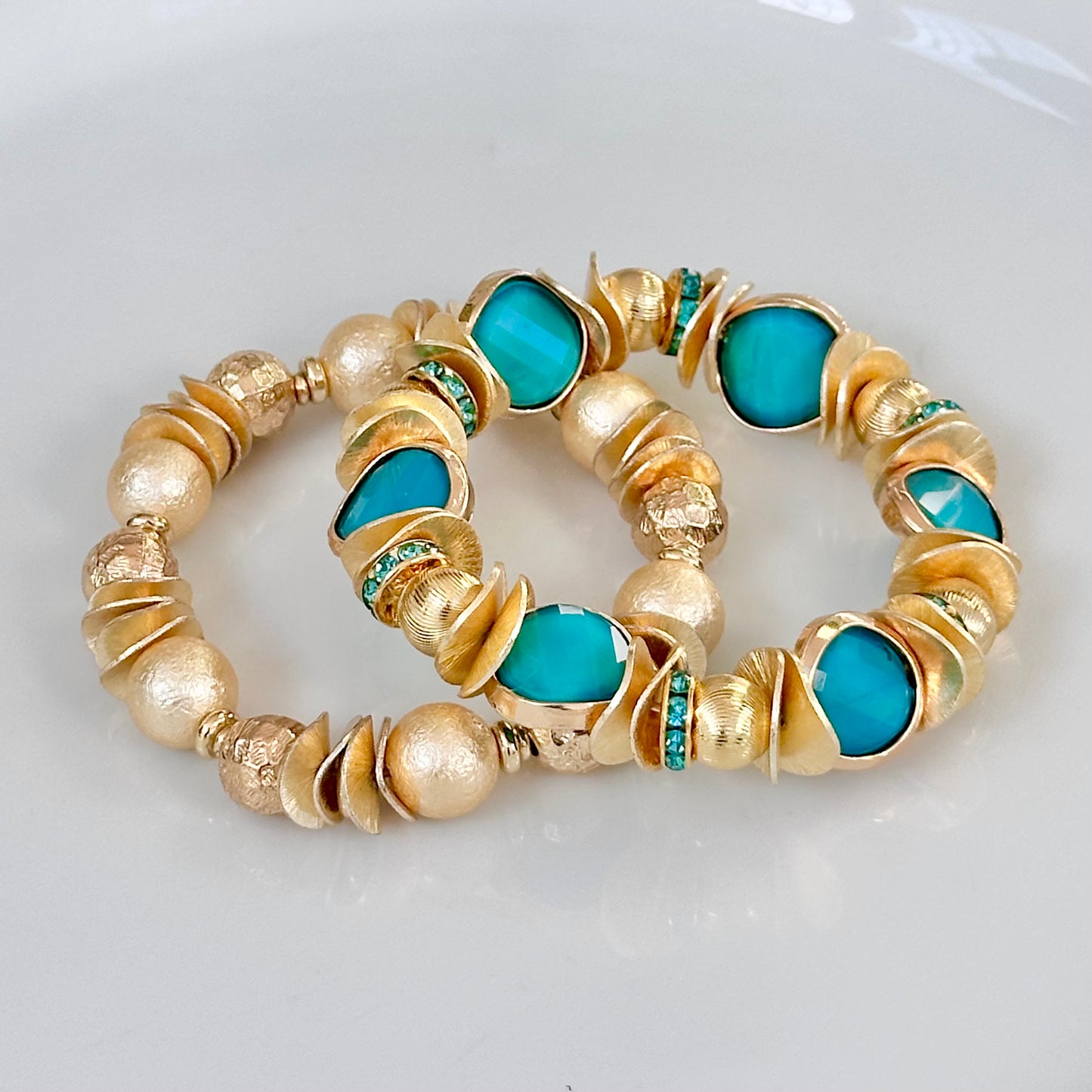 TURQUOISE AND GOLD COIN BANGLE WITH WAVY DISC, GOLD AND CRYSTAL ACCENTS