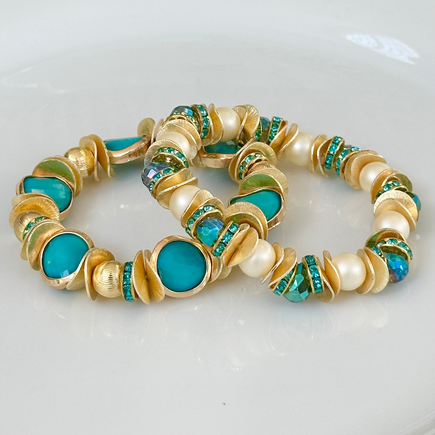 FACETED TEARDROP TURQUOISE BANGLE WITH PEARL, GOLD WAVY DISC, AND CRYSTAL ACCENTS