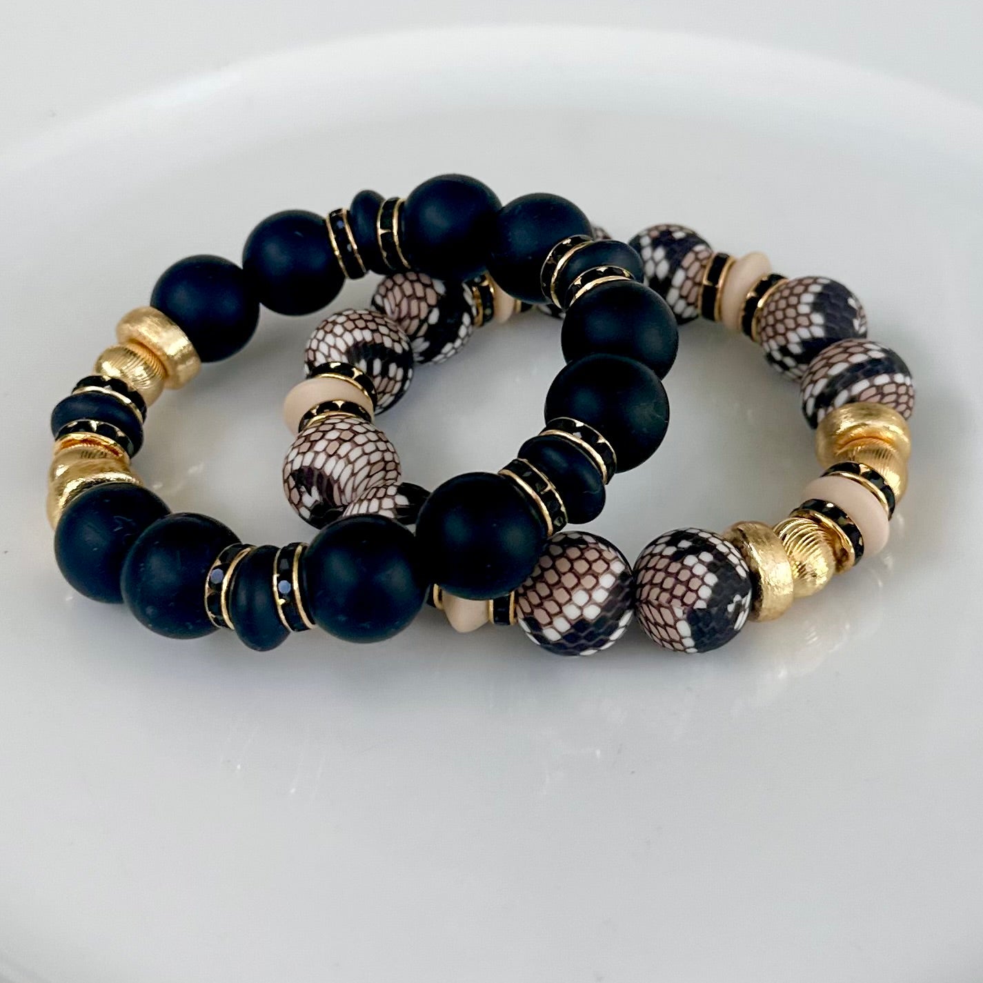BLACK BANGLE WITH GOLD AND BLACK CZ ACCENTS
