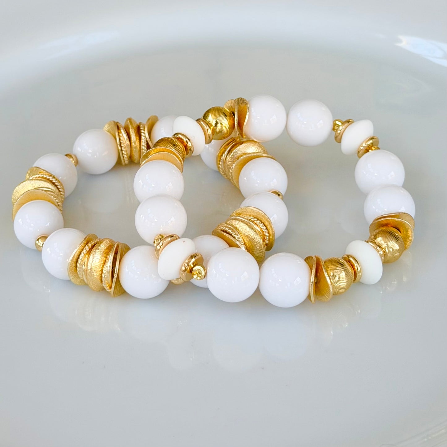 WHITE AND GOLD WAVY DISC BANGLE WITH BRUSHED GOLD ACCENTS