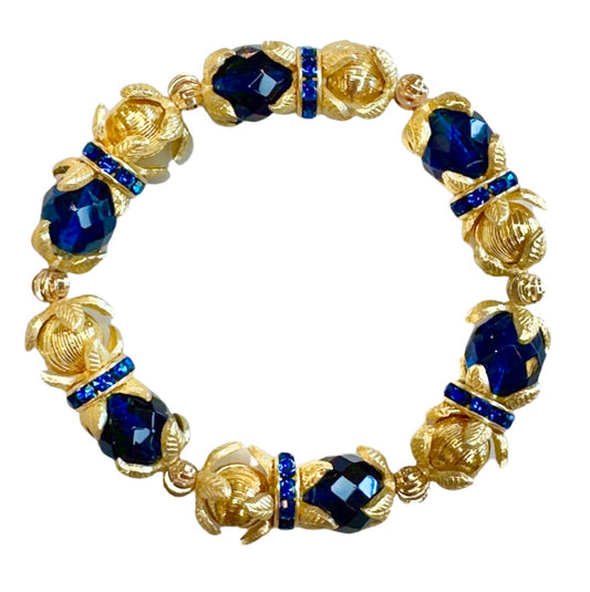 GOLD FLORAL WITH BLUE BANGLE WITH CZ ACCENTS