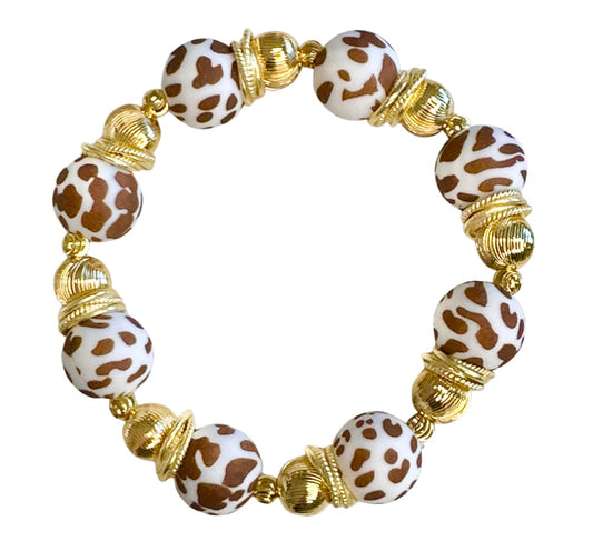 BROWN AND WHITE COW PATTERN BANGLE WITH GOLD ACCENTS