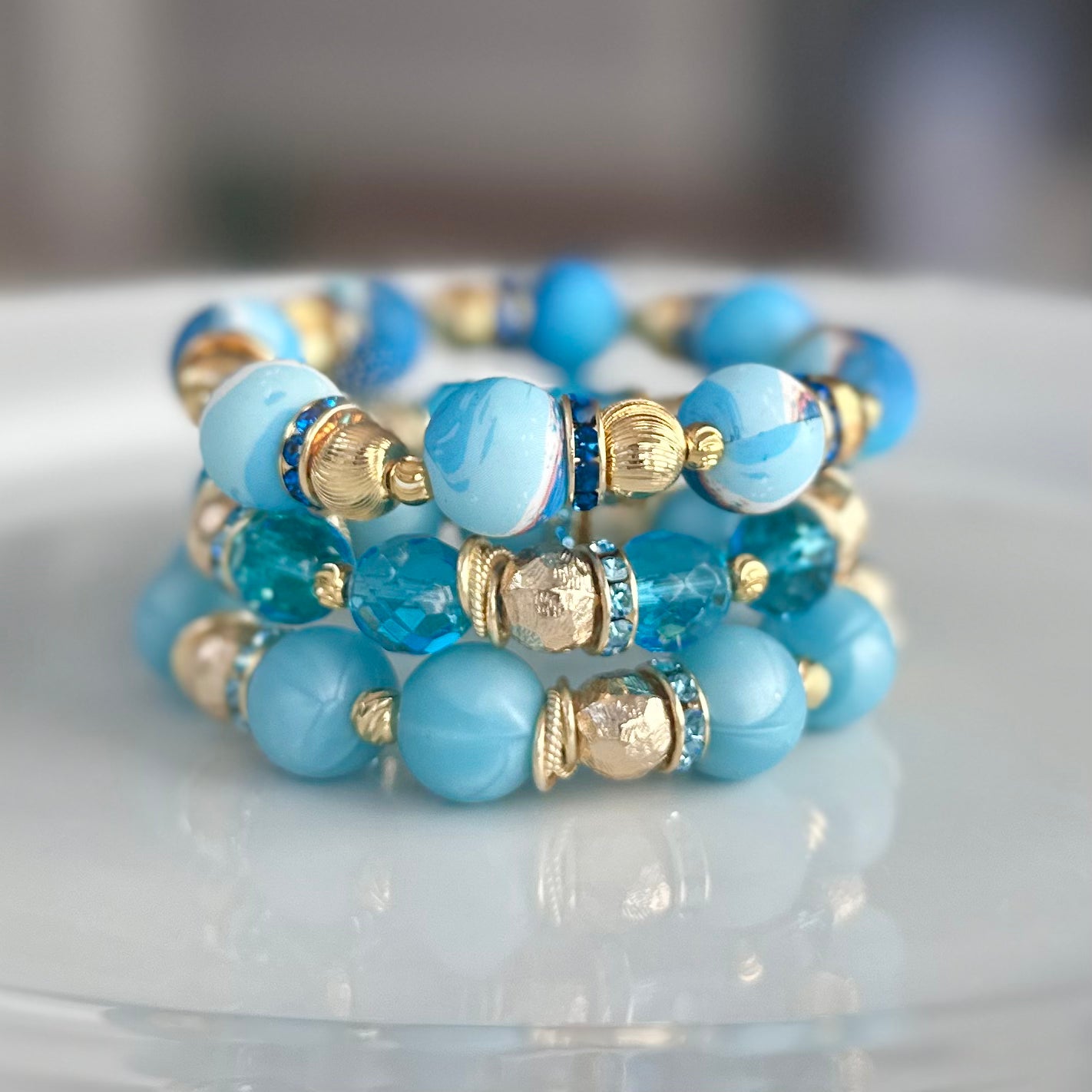 PEARLIZED TURQUOISE AND GOLD BANGLE WITH CZ ACCENTS