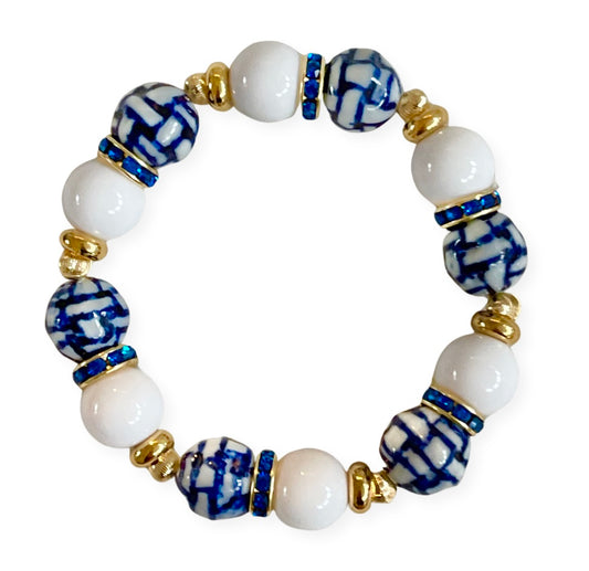 PORCELAIN WOVEN BLUE AND WHITE BANGLE , GOLD, AND CZ